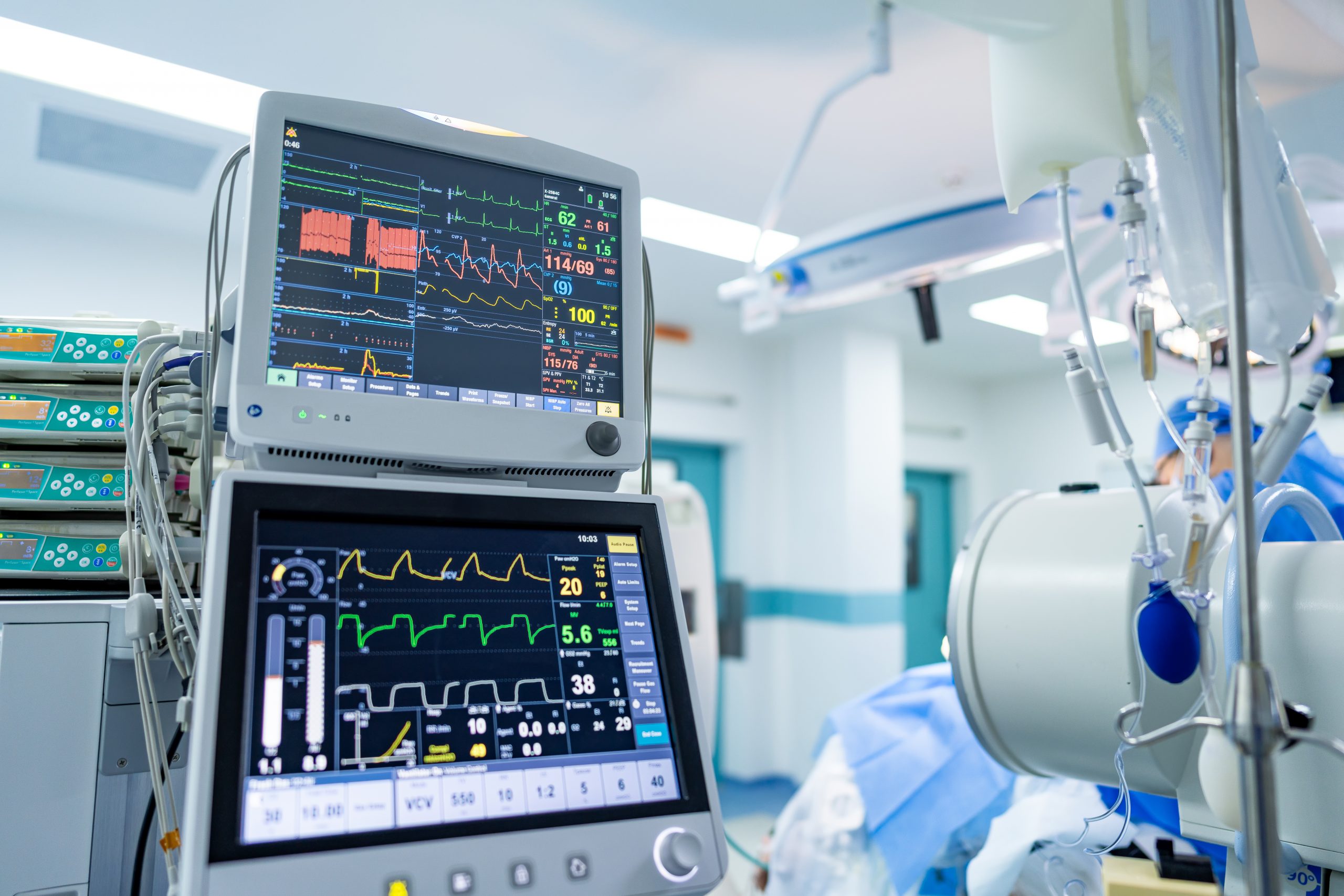 OR surgical monitoring gear. Advanced medical equipment displays vital signs and patients' data in a modern hospital operating room environment.